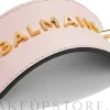 Haarspange mit goldenem Logo